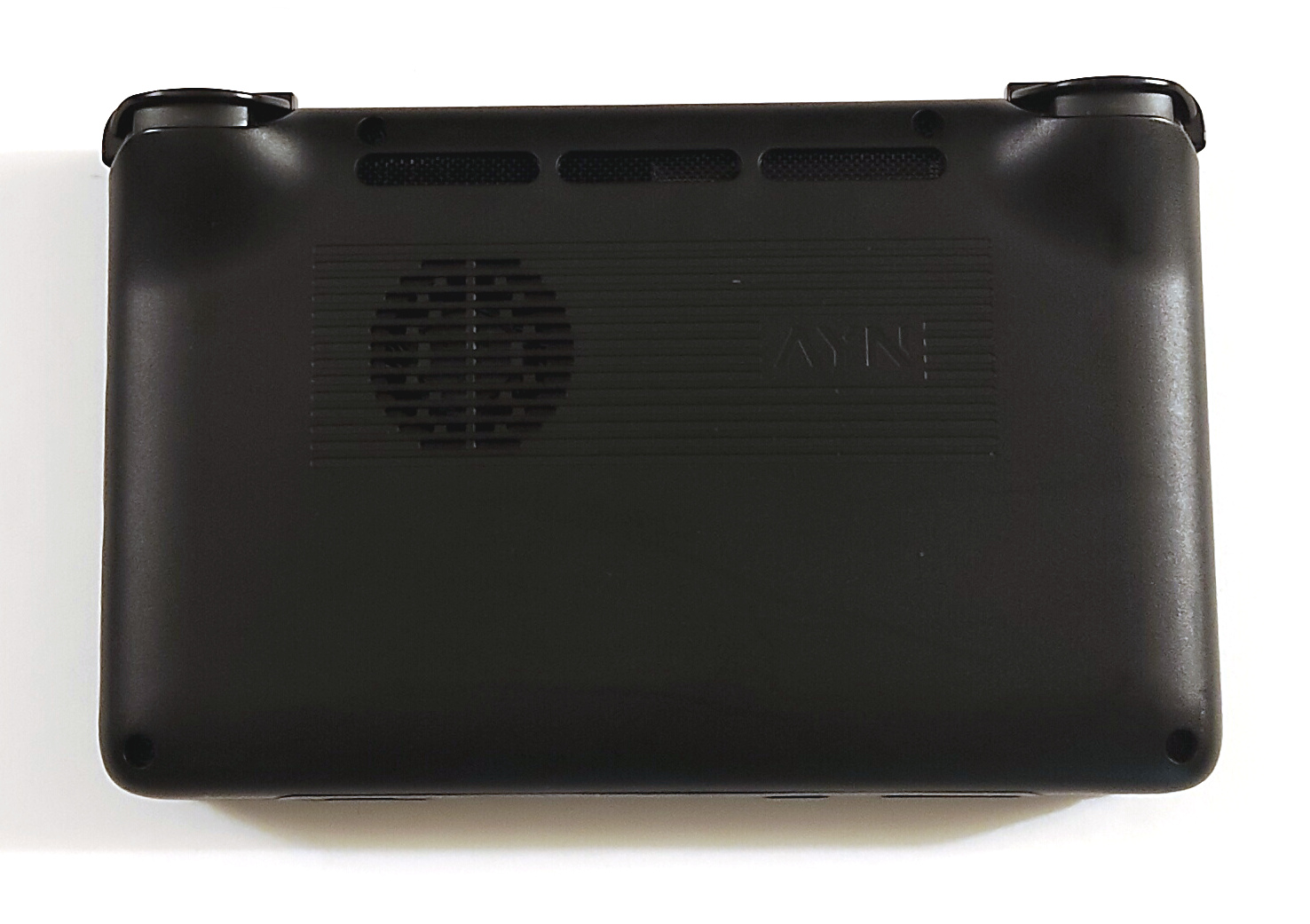 The back cover of the AYN Thor with its intake and exhaust vents